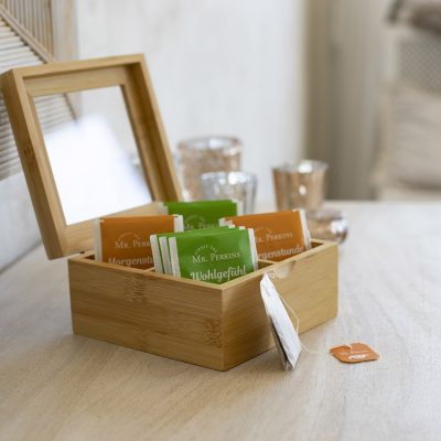 Four scented - apple, orange, cinnamon, coffee - candles isolated on white background. with PS paths.