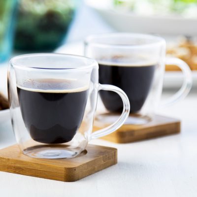 Four scented - apple, orange, cinnamon, coffee - candles isolated on white background. with PS paths.